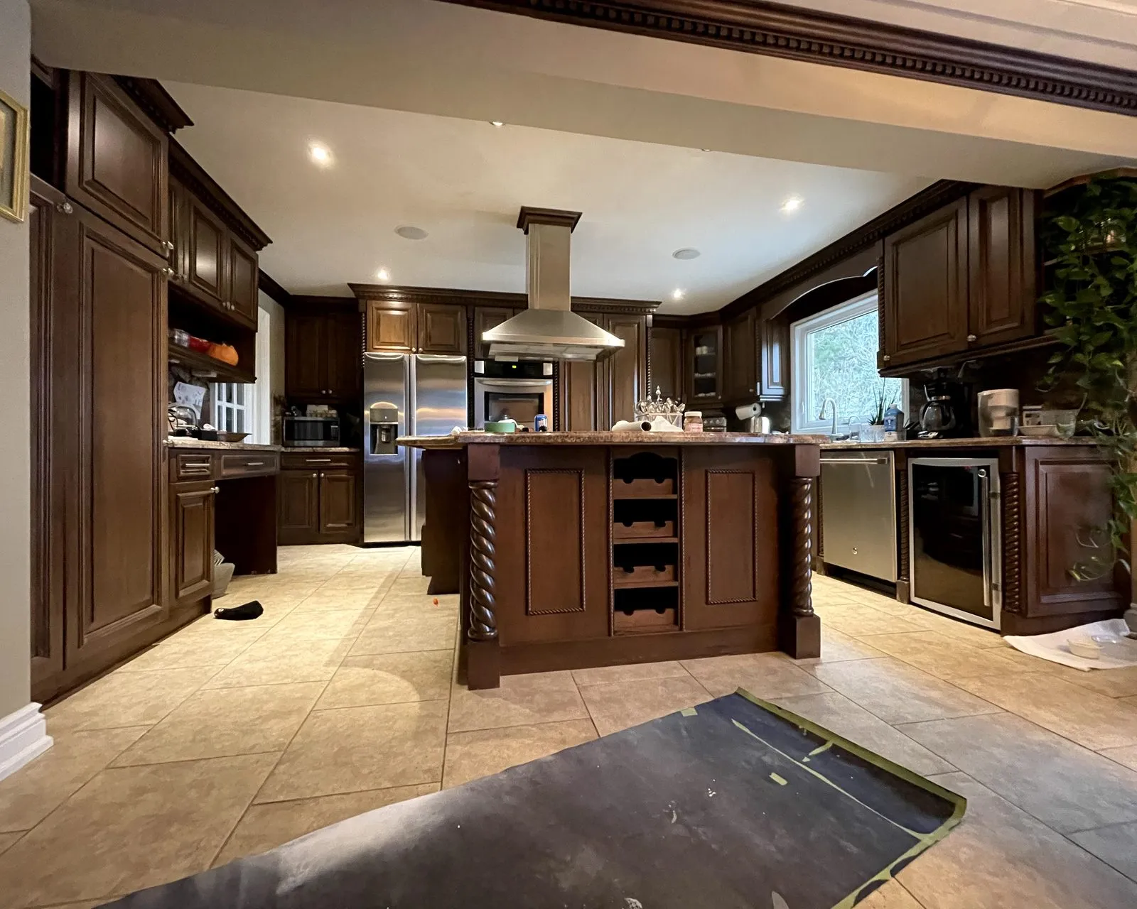 Before — espresso perimeter sprayed cream, island a contrasting dark tone, granite and backsplash kept in East Credit, Mississauga