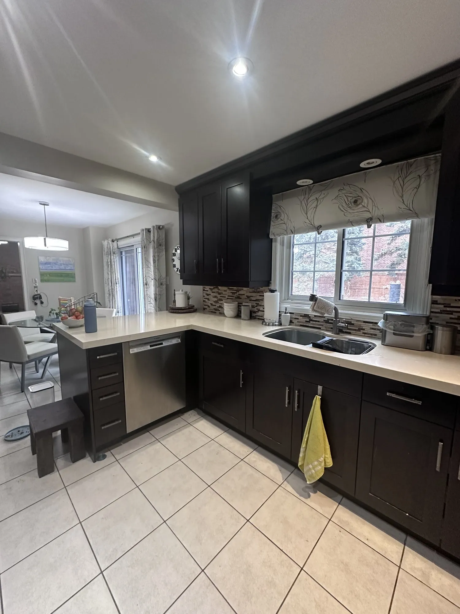 Before — espresso sprayed a light green, new handles, cabinets only in Erin Mills, Mississauga
