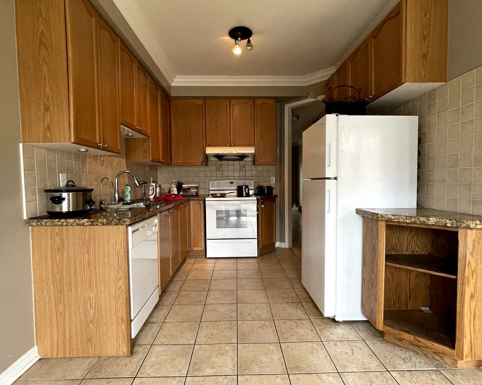 Before — oak sprayed sage grey, floor and backsplash by others — Abbey Park, Oakville