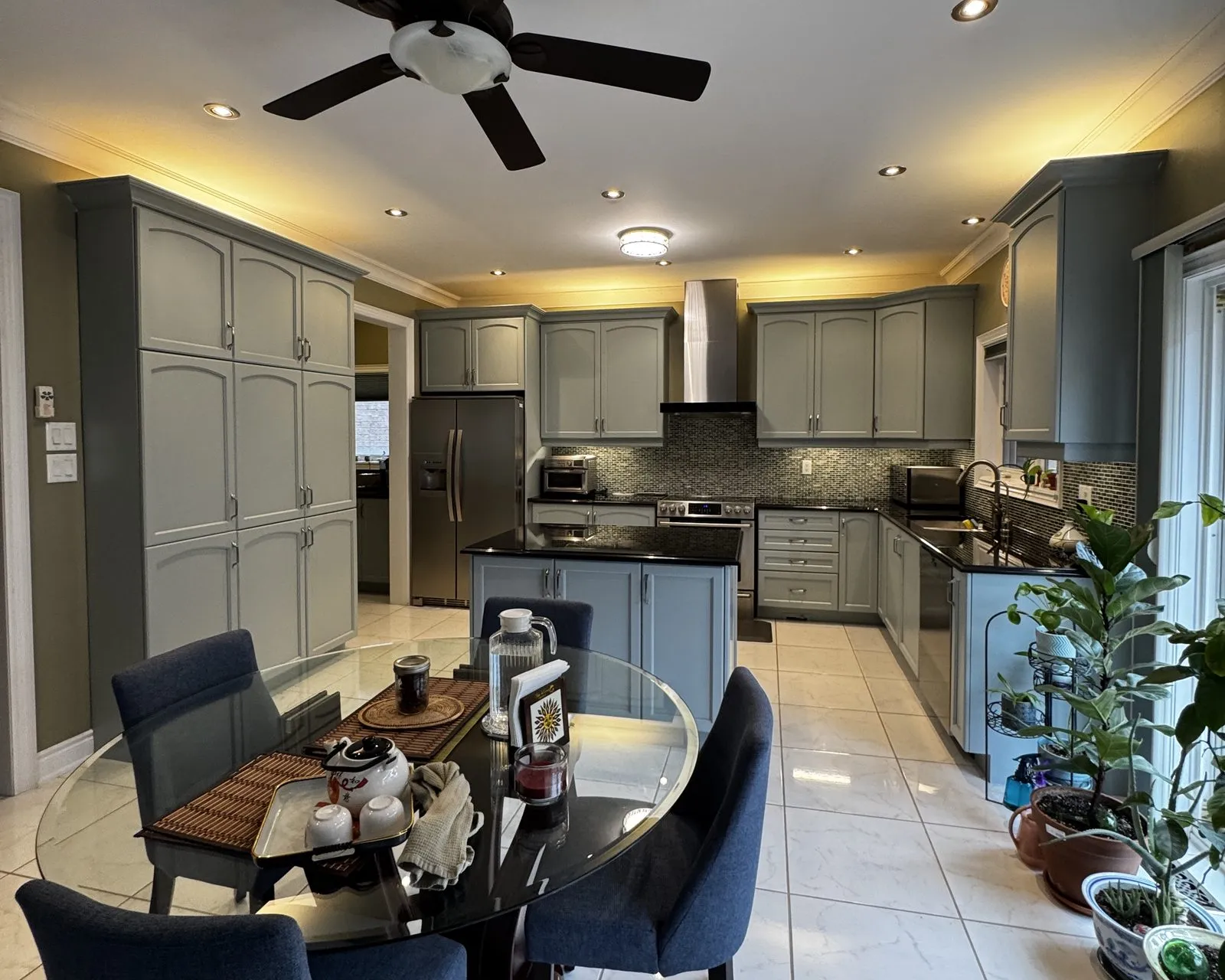 After — dark cherry sprayed Boothbay Gray, island extended with new cabinets, brushed nickel pulls in Jefferson, Richmond Hill
