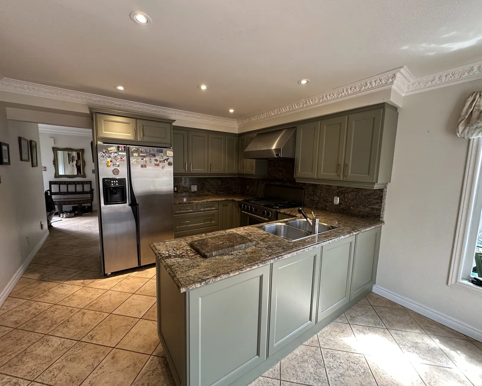 After — cream sprayed Tate Olive, new handles, granite kept in Maple, Vaughan