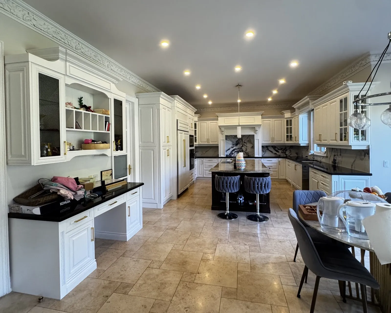 After — cream glazed cabinets sprayed Oxford White, gold bar pulls in Thornhill, Vaughan