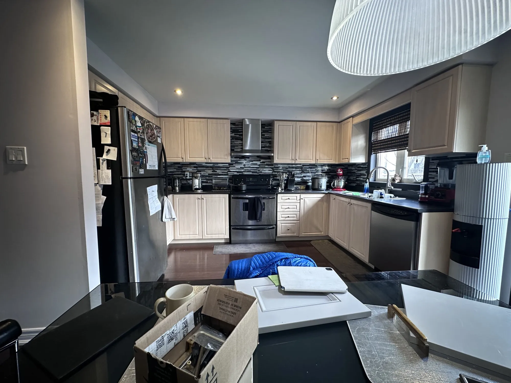 Before — dated cream doors replaced, boxes sprayed white in Meadowvale Village, Mississauga