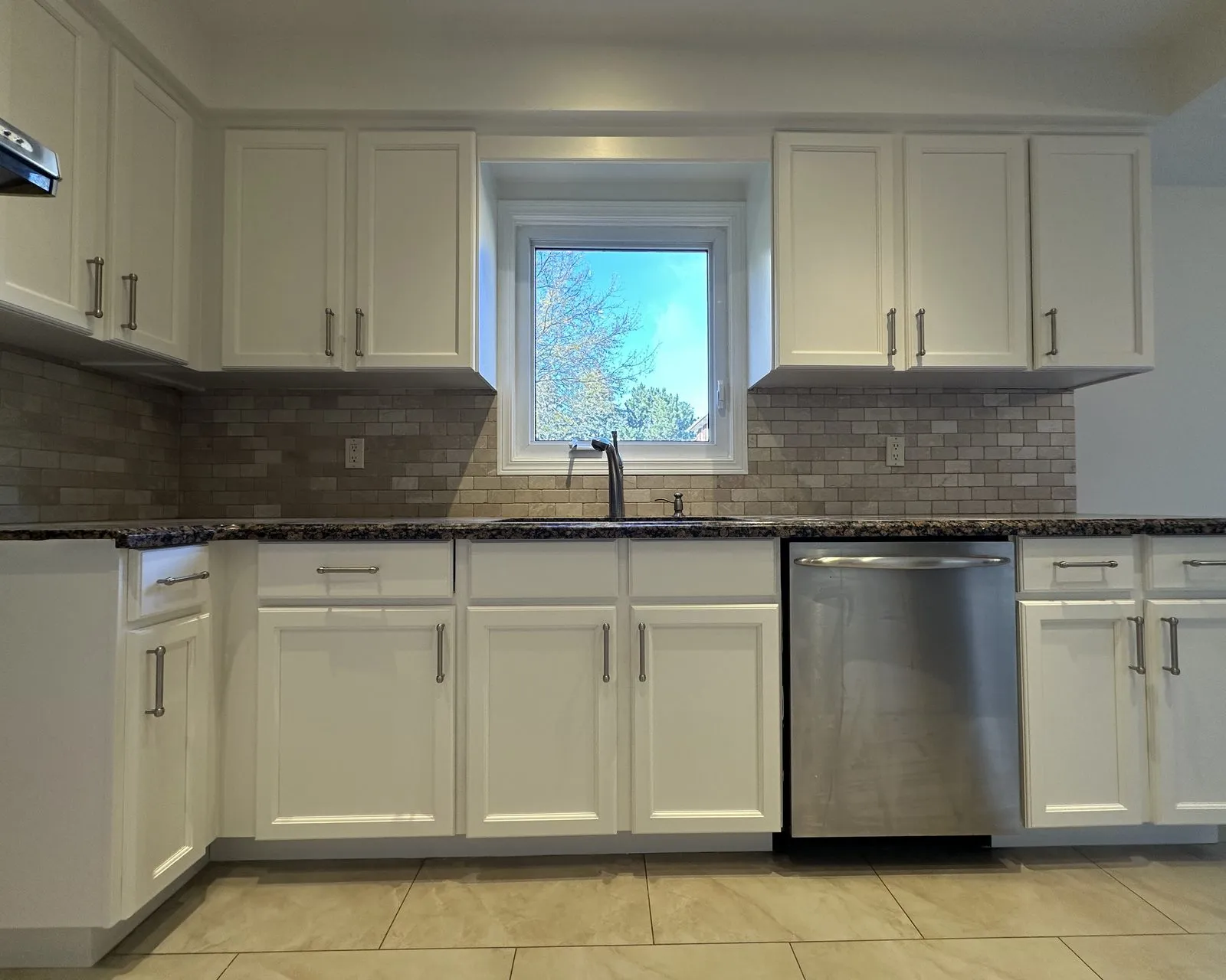 After — oak cathedral doors replaced with maple Shaker, all in White Dove in Mill Pond, Richmond Hill