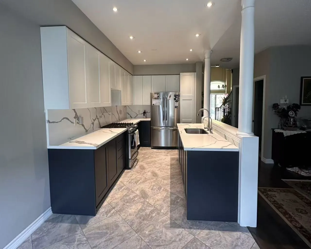 After — oak to two-tone shaker, new quartz in Rouge Woods, Richmond Hill