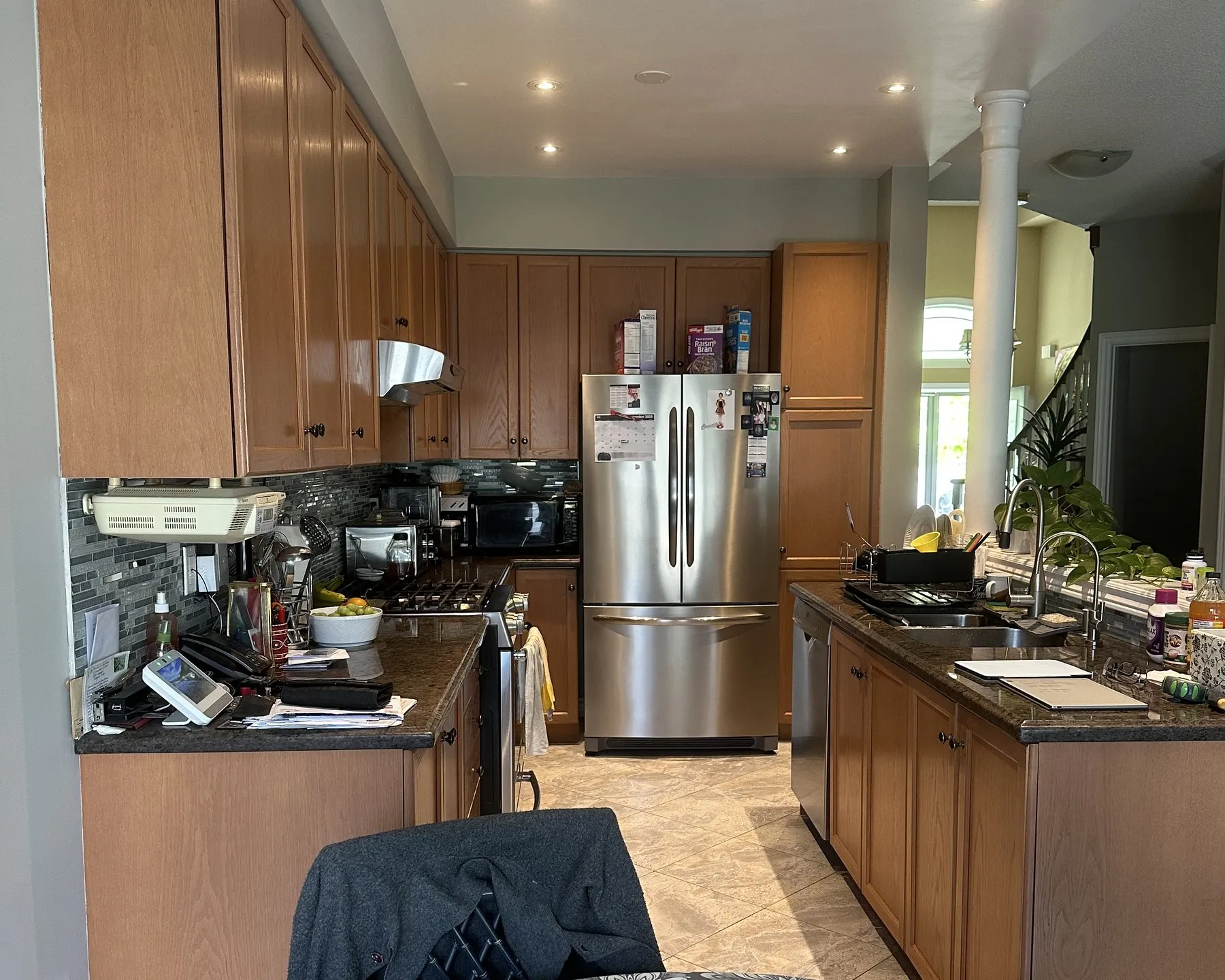 Before — oak to two-tone shaker, new quartz in Rouge Woods, Richmond Hill