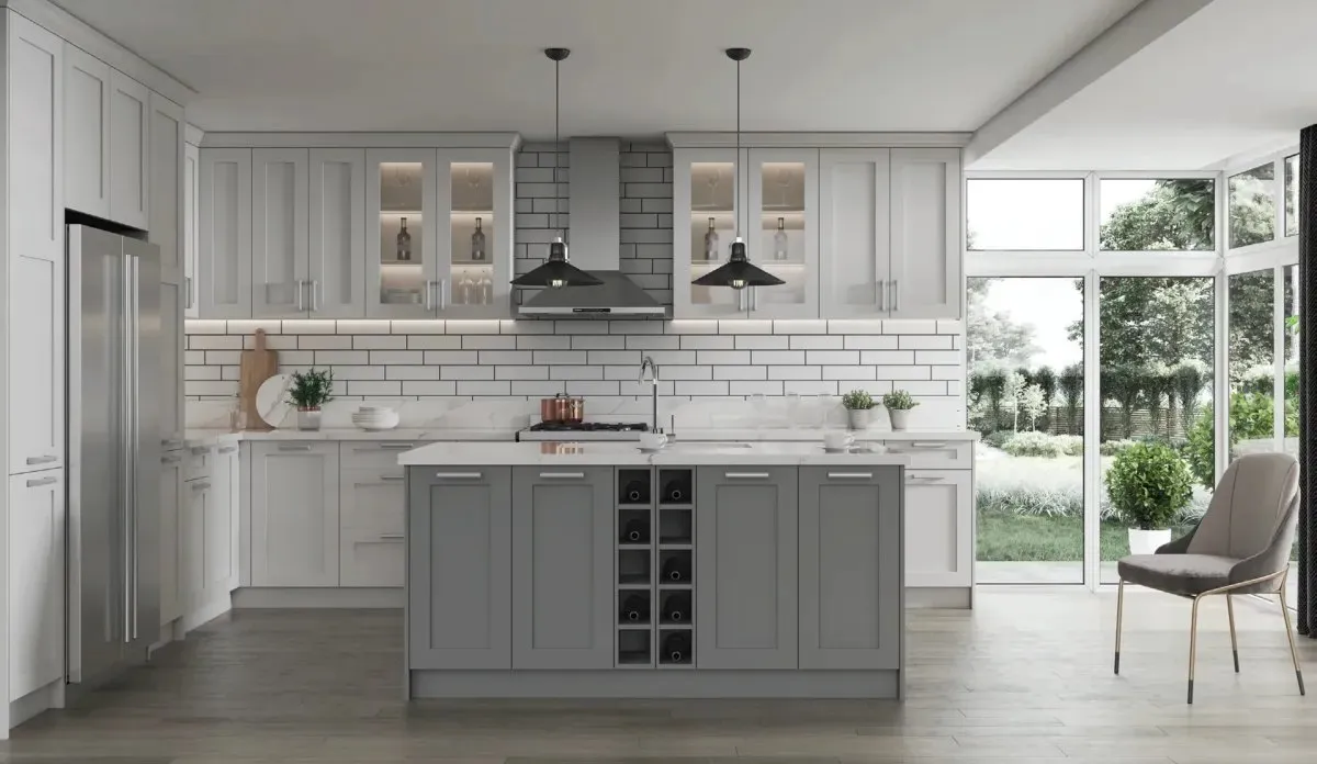 A white and grey shaker kitchen with a full run of wall and base cabinets, an island and a subway-tiled splashback