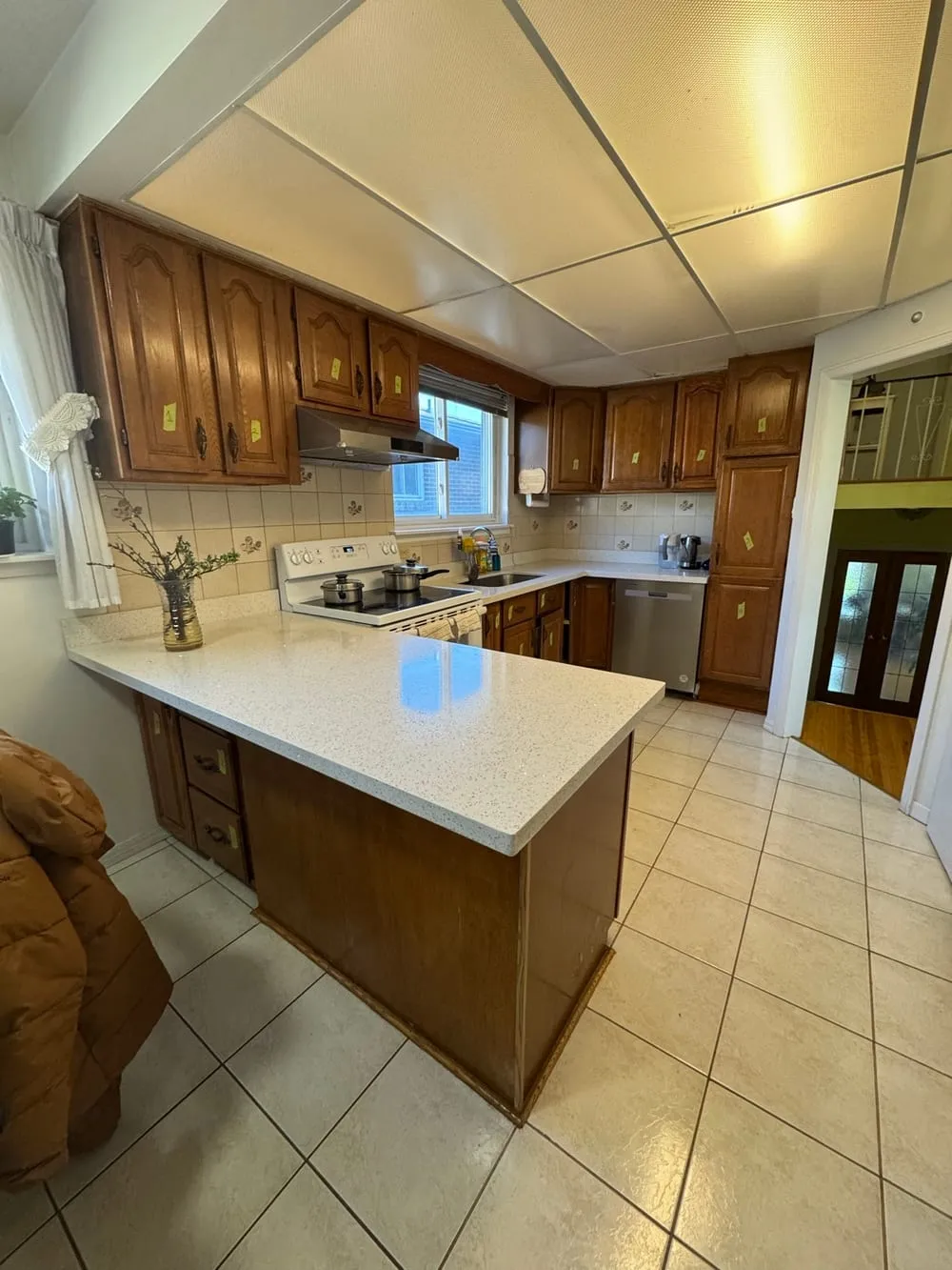 An Oakville kitchen with dark oak cabinets, before any work