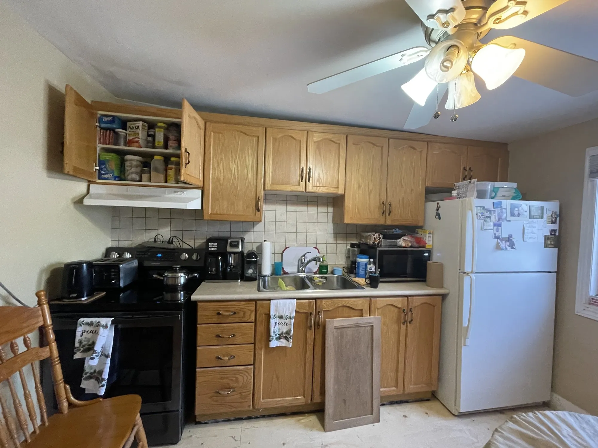 Before — new stained kitchen built to a floor plan, fitted under a sloping ceiling in Weston-Pellam Park, Toronto