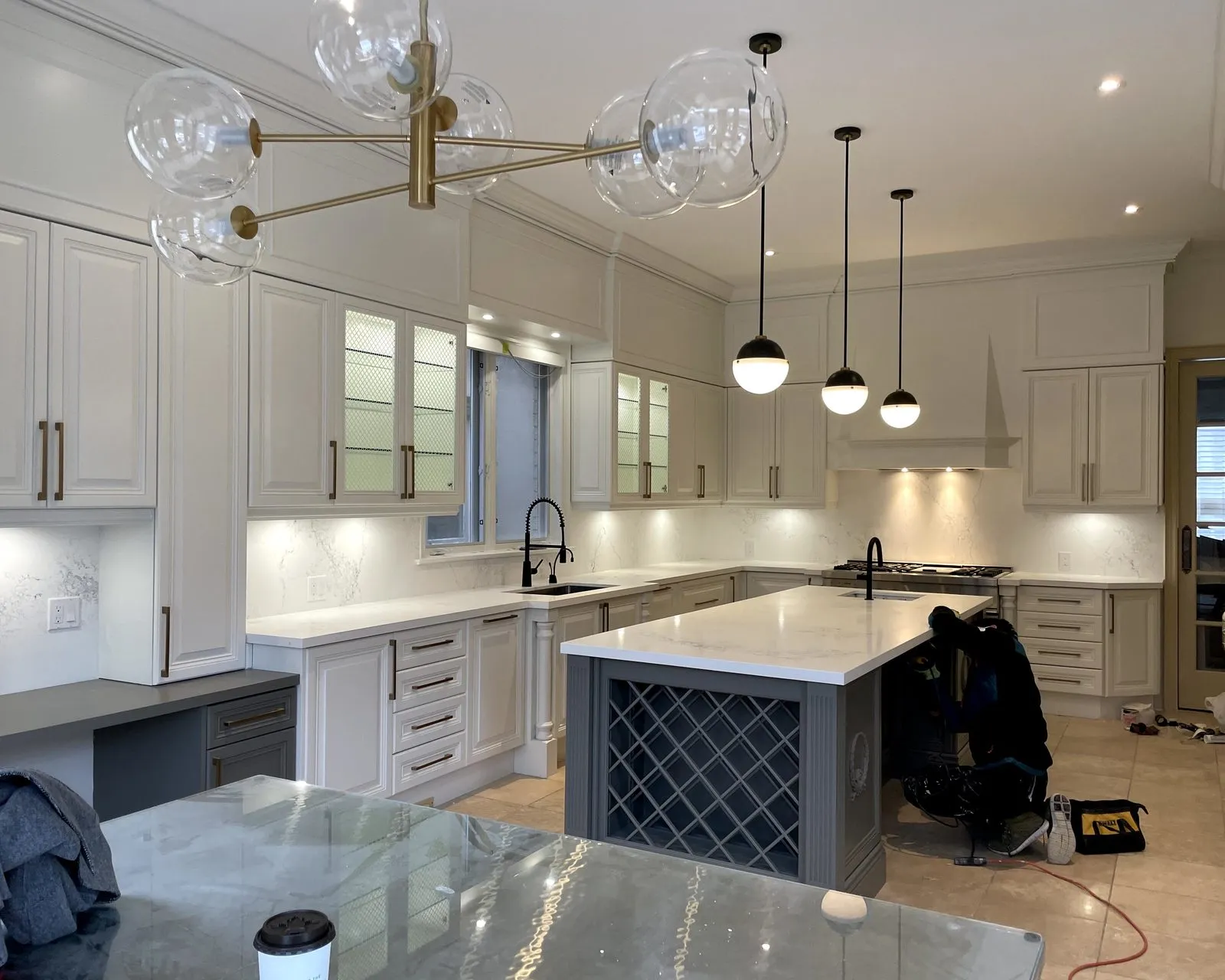 After — antiqued cream rebuilt in white, charcoal island kept lattice — Southeast Oakville, Oakville