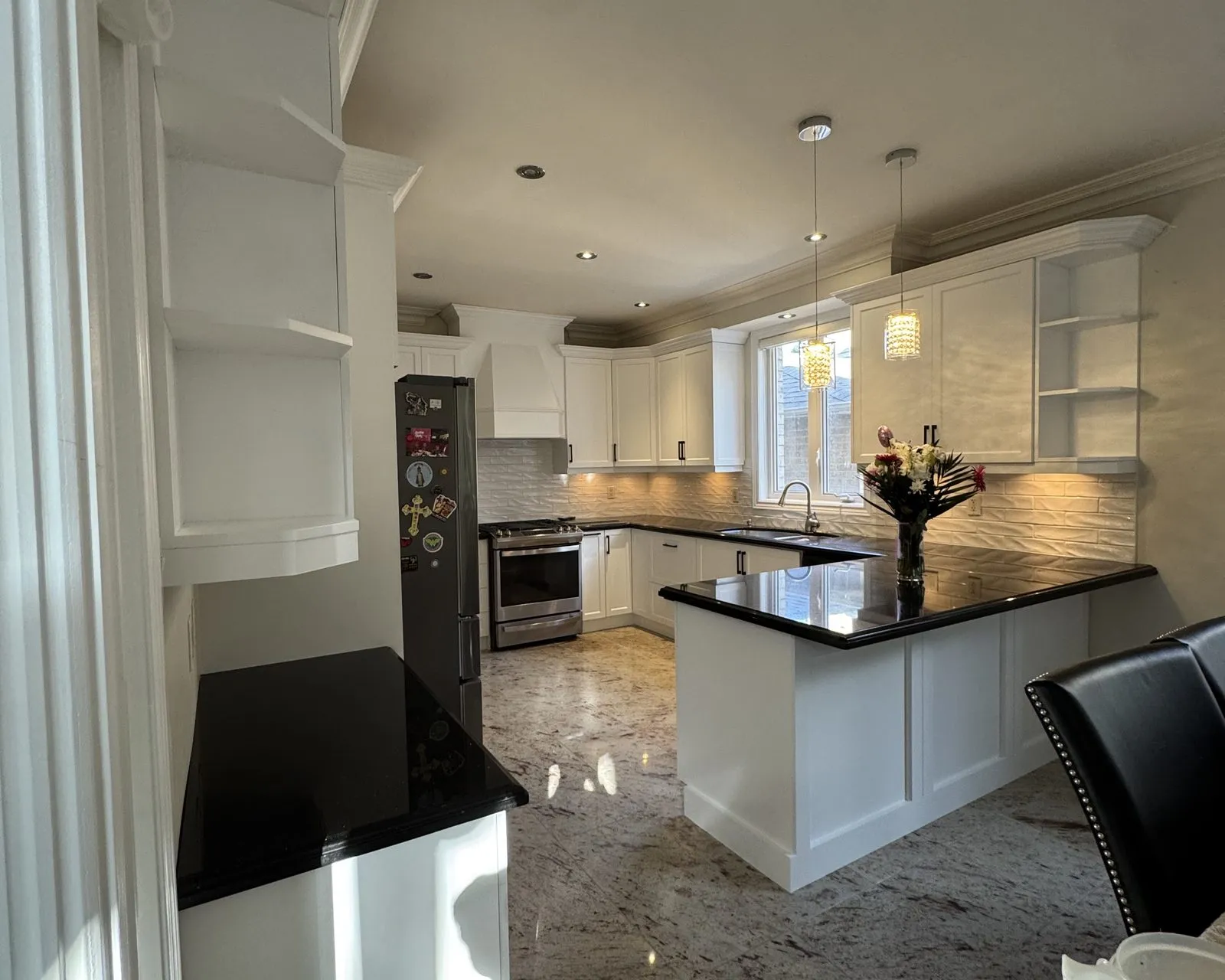 After — cream raised-panel to white, granite kept — Lakeshore Woods, Oakville