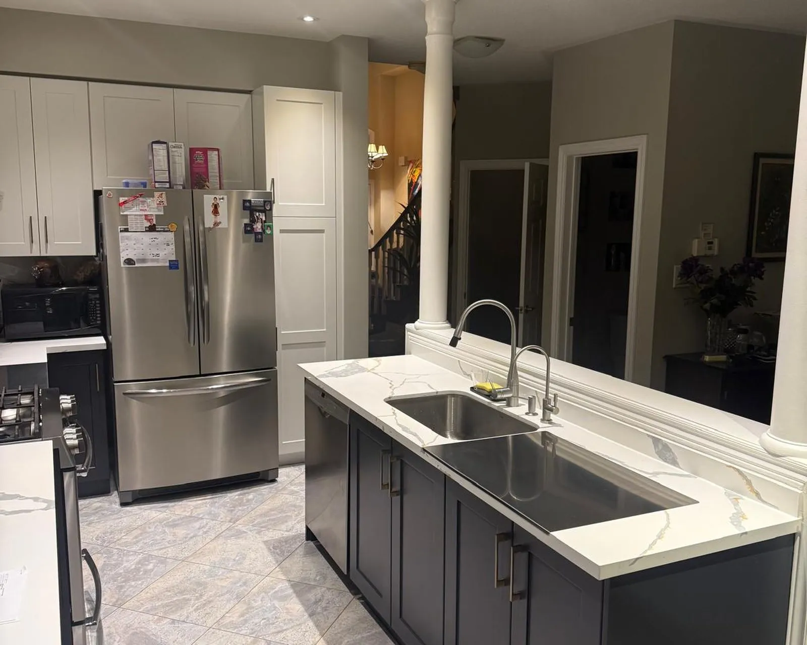 After — oak to two-tone white and navy, new quartz — Oak Park, Oakville