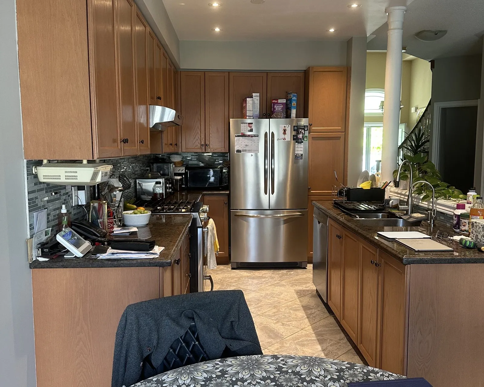 Before — oak to two-tone white and navy, new quartz — Oak Park, Oakville