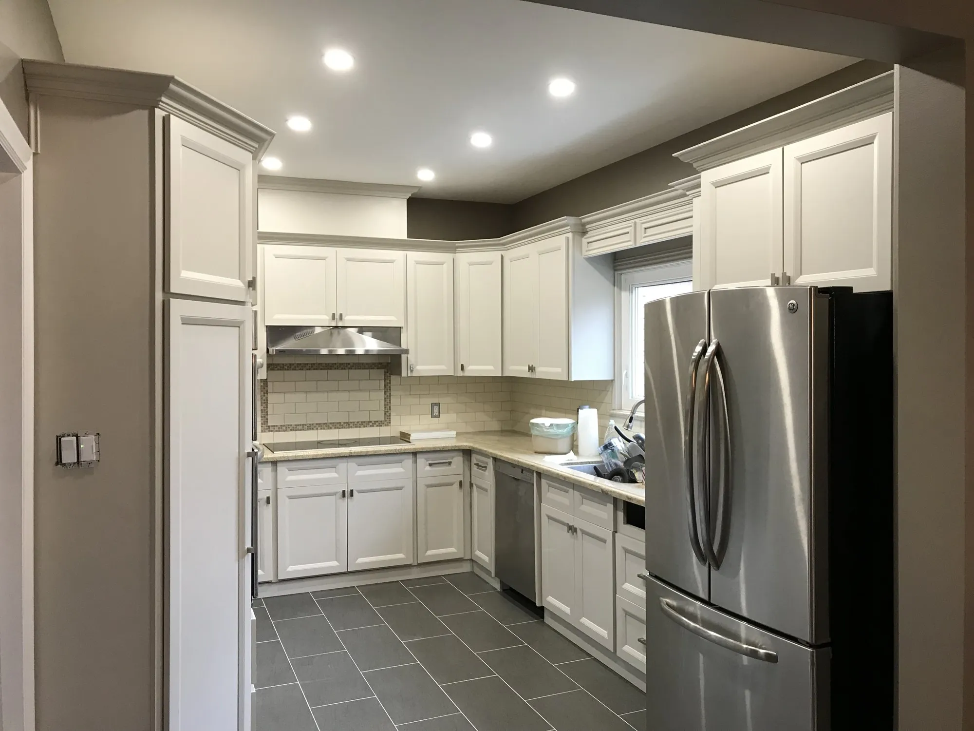 After — dark oak to white, same boxes and same layout — Palermo, Oakville