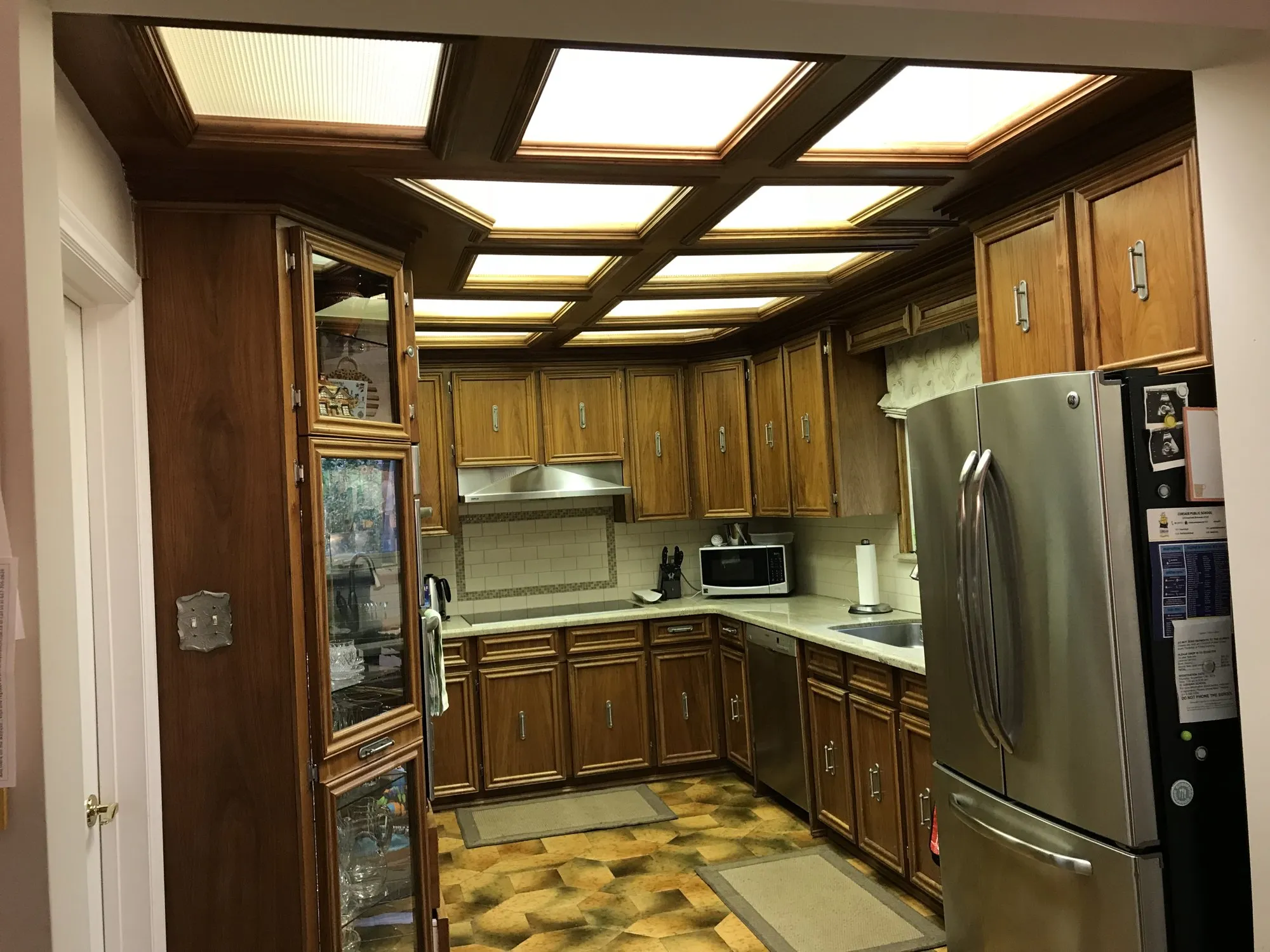 Before — dark oak to white, same boxes and same layout — Palermo, Oakville