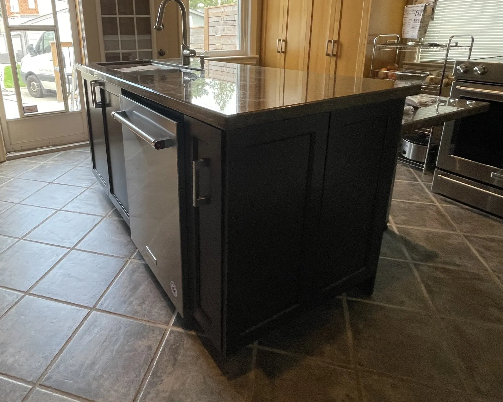 After — black island worn through, recoated in the same colour — Joshua Creek, Oakville