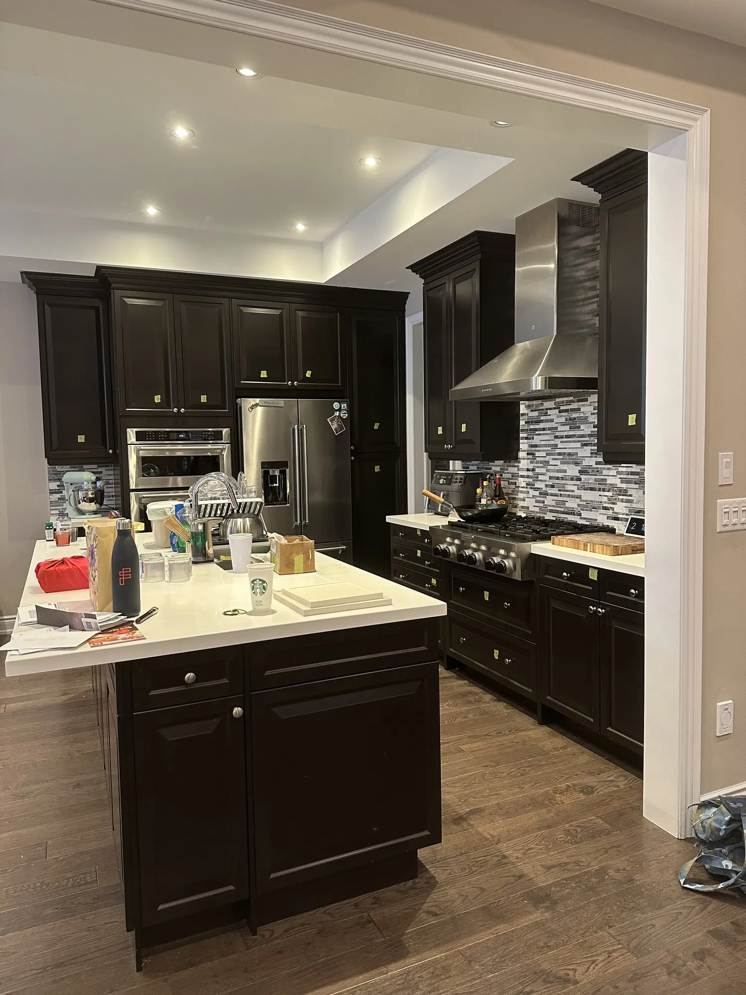 Before — dark espresso sprayed one tone white, quartz and backsplash kept in Glenorchy, Oakville