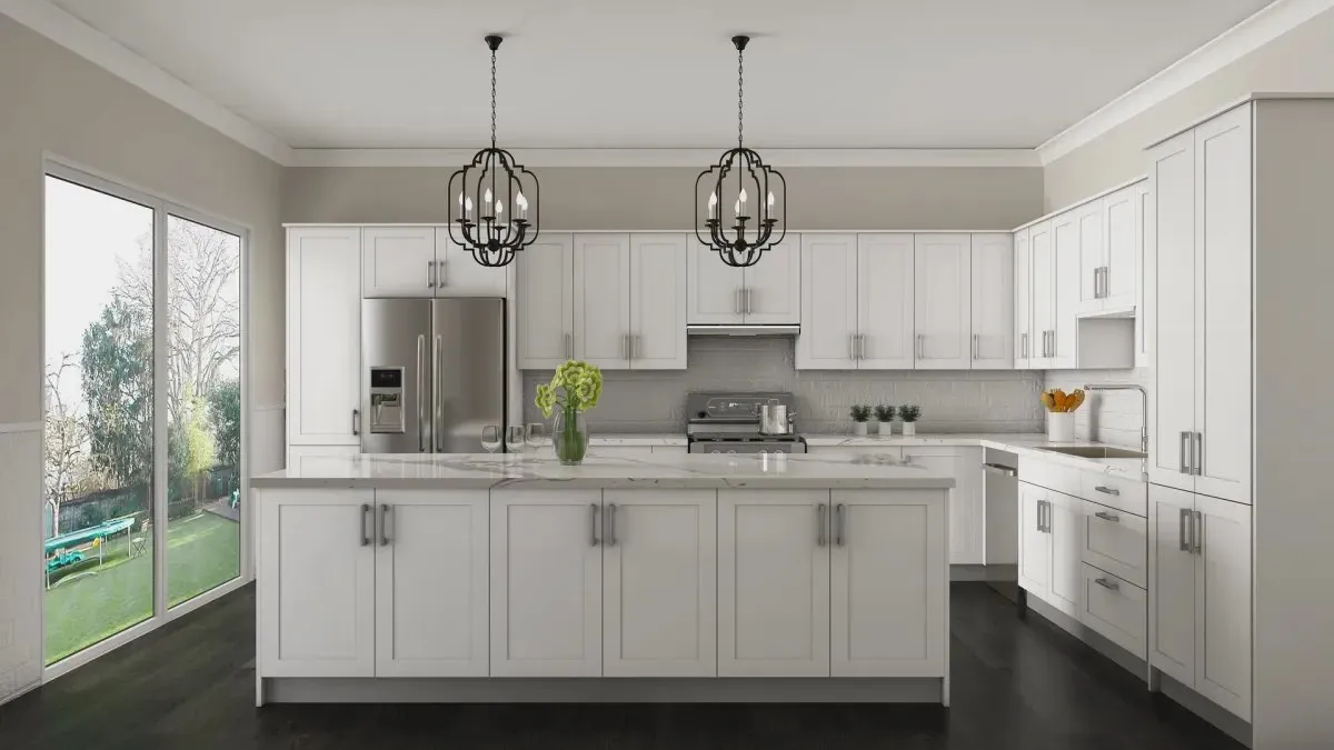 A bright white shaker kitchen with an island, full-height pantry cabinets and glass doors onto a garden