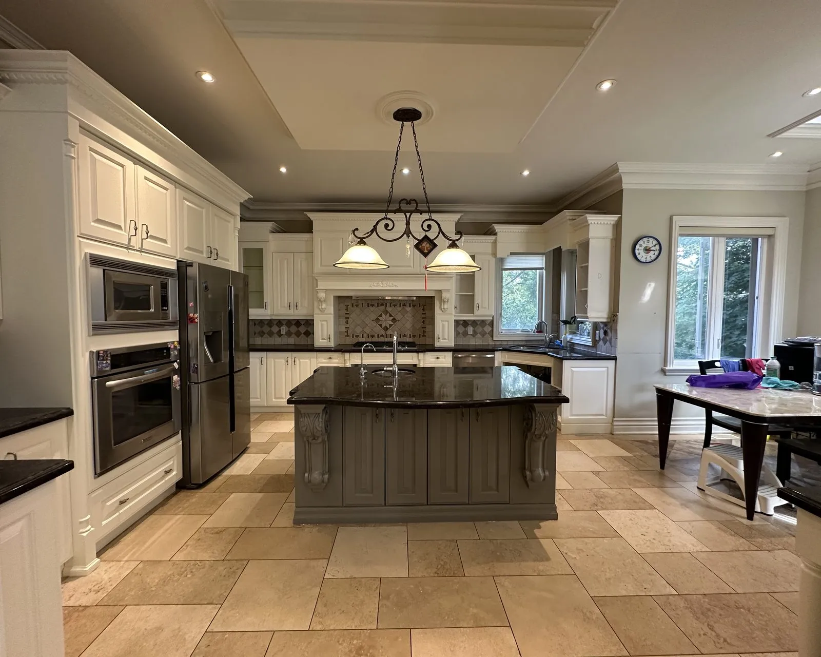 After — worn tops replaced, marble-look quartz through — Bronte Harbour, Oakville