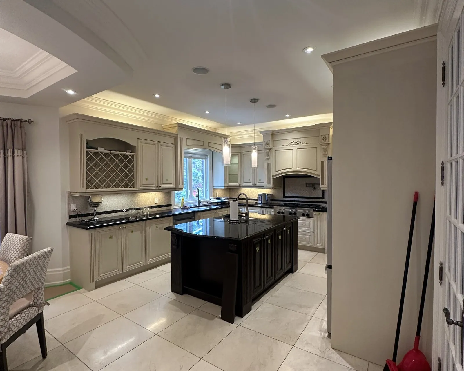Before — dark granite out, white quartz through and an island top — Southwest Oakville, Oakville